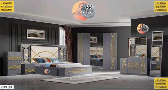 CHAMBRE A COUCHER ARMOIRE 6BATTANTS
6PIECES image 4
