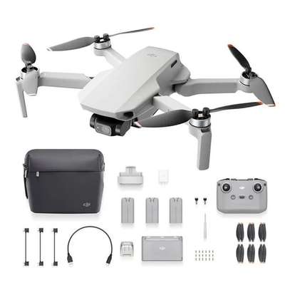 DJI mini 2, 4 batterie + extra fly more combo drone mavic image 1