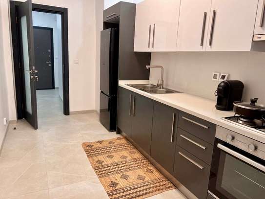 Appartement F4 à louer à la Zone B proche mairie point E image 5