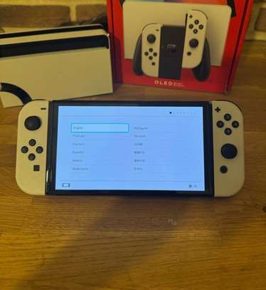 NINTENDO SWITCH OLED +Jeux image 1
