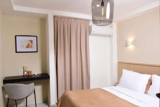 Chambre de luxe a KADISS HOTEL, Sicap Foire image 2