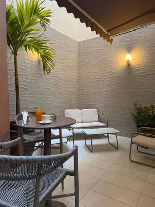 Chambre de luxe a KADISS HOTEL, Sicap Foire image 8