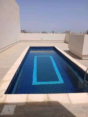 Appartement avec piscine commune et salle de sport image 1