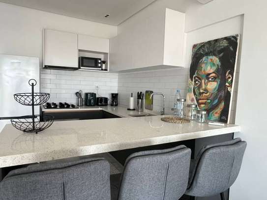 Magnifique Appartement Meublé F2 á Sicap Baobab image 11