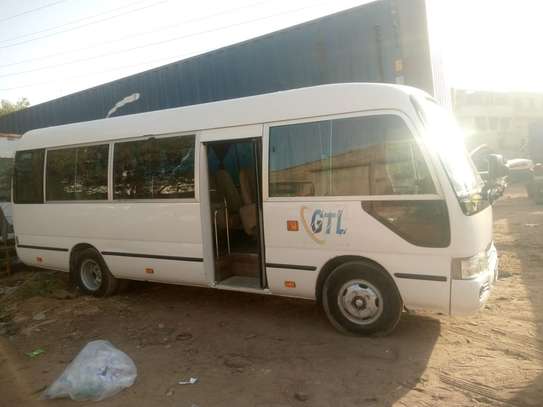 Location Toyota Coaster Diesel – 27 Places image 1
