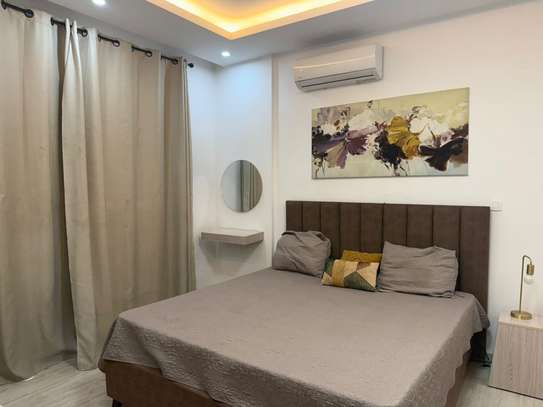 Appartement F2 meublé - Point - E image 10
