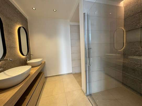 Appartement Rdc corniche Ouakan piscine privée jardin image 12