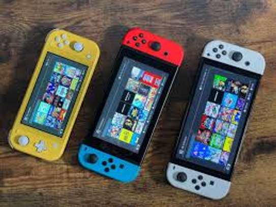 Nintendo Switch flaché plus 10jeux et fc26 image 2