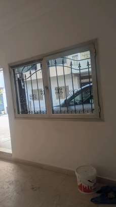 A louer grand appartement rdc image 9
