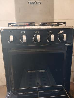 Nexon cuisinière gaz 4 feux noir avec four image 4