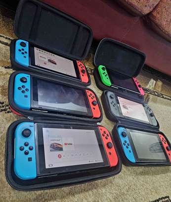 Nintendo Switch flaché plus 10jeux et fc26 image 3