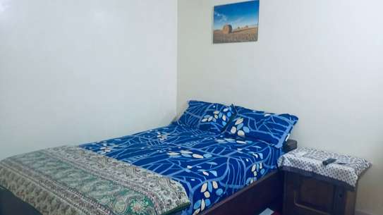 Lit double bois massif naturel avec matelas inclus image 4