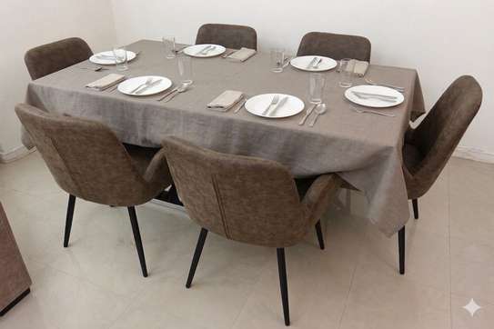 Table à manger design + 6 chaises en cuir — Comme neuve image 4