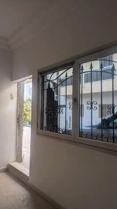 A louer grand appartement rdc image 2