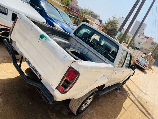 Nissan pickup image 1