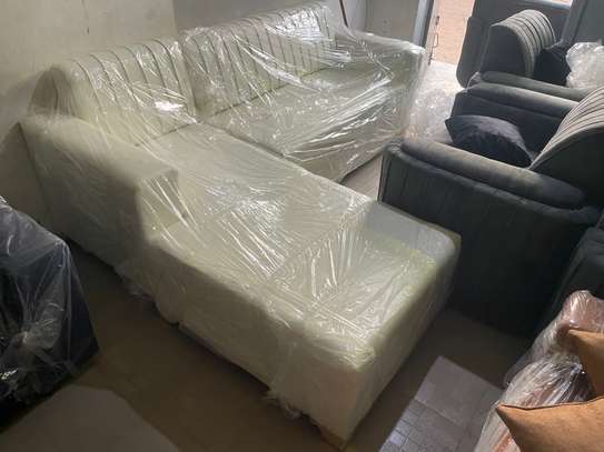 Canapé d'angle moderne gris clair avec pouf orange image 10