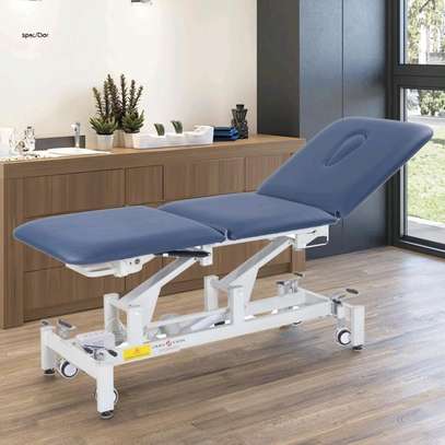 Table de massage électrique réglable avec roulettes image 7