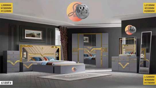 CHAMBRE A COUCHER ARMOIRE 6BATTANTS
6PIECES image 2