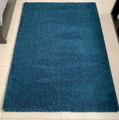 Tapis bleu 170cm sur 120cm image 1