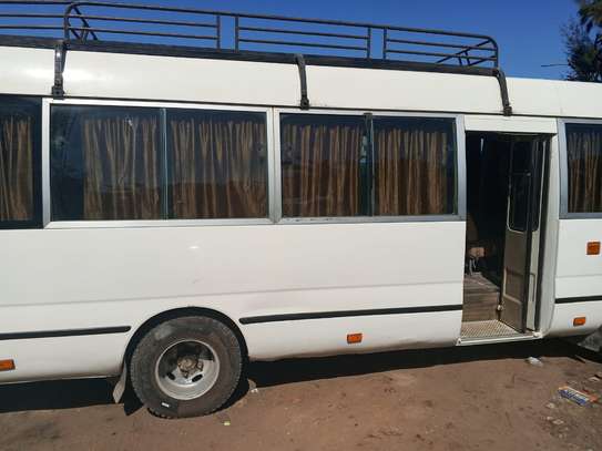 Location Toyota Coaster Diesel – 27 Places image 2