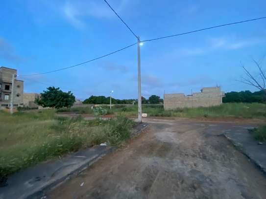 Titre foncier individuel 150m2 à Bambilor route bitumée image 3