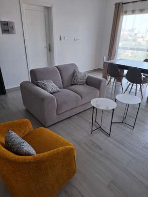 chambre-salon meublé à la cité Apix image 9