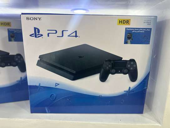 PLAYSTATION 4 SLIM NEUF avec 10 JEUX image 1
