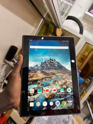 Tablette lenovo / 16GB memoir  Et 2GB de ram + sim image 13