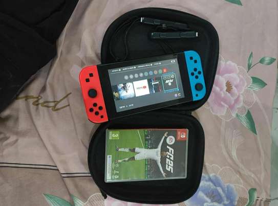 Nintendo Switch flaché plus 10jeux et fc26 image 5