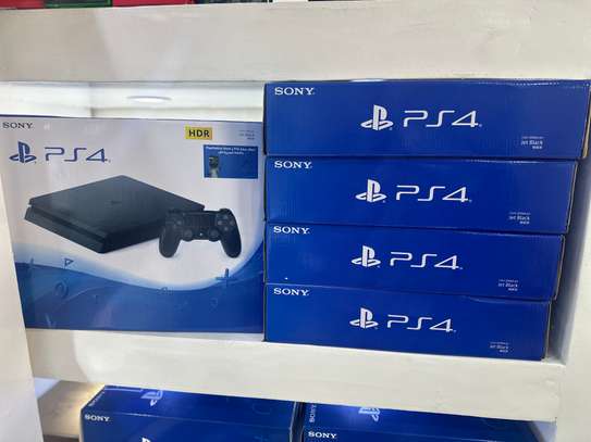 PlayStation 4 Slim neuf avec 10 jeux image 2