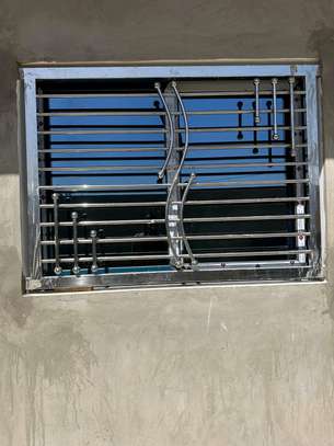Grille fenêtre acier inoxydable design moderne 60x40cm image 2