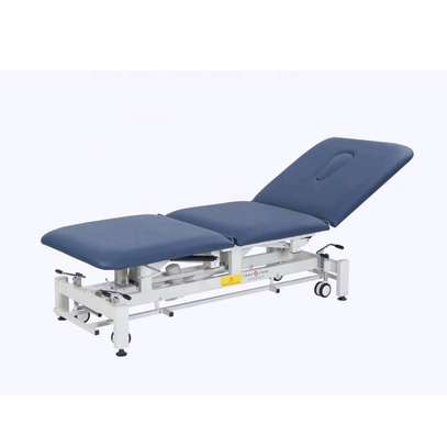 Table de massage électrique réglable avec roulettes image 4