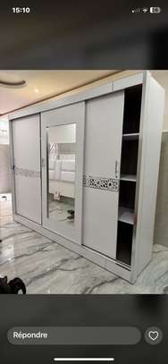 Armoire 4 portes bois  avec miroir central image 9
