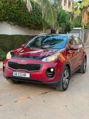 Kia Sportage SUV compact rouge dynamique image 2