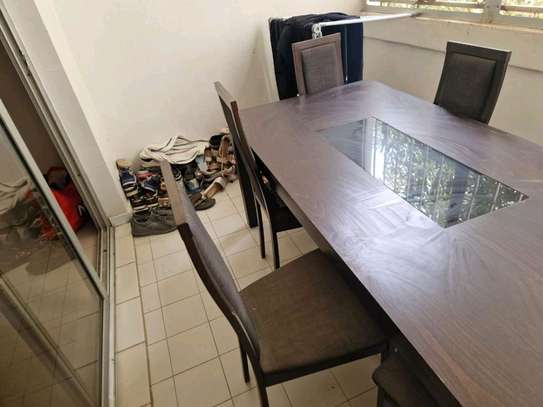 Table a manger 8 places avec 6 chaises image 5