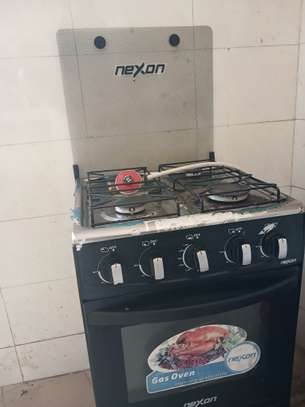 Nexon cuisinière gaz 4 feux noir avec four image 2