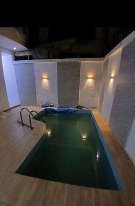 A LOUER UNE VILLA DE 05 CH , SALON AVEC PISCINE A NGOR image 5