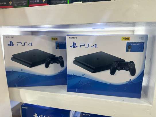 PlayStation 4 Slim neuf avec 10 jeux image 4