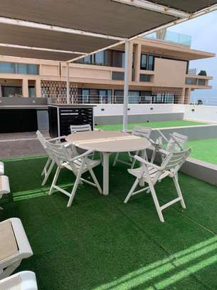 F3 meublé cosy Almadies - terrasse aménagée vue sur mer image 2