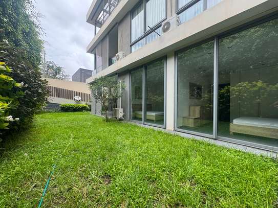 Appartement Rdc meublé fan résidence jardin privé 3 chambres image 4