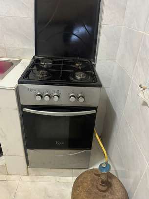 Cuisinière Roche 4 feux + four, gaz offert image 2