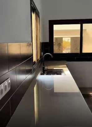 VILLA R+1 A VENDRE / NGERIGNE PETITE COTE image 11