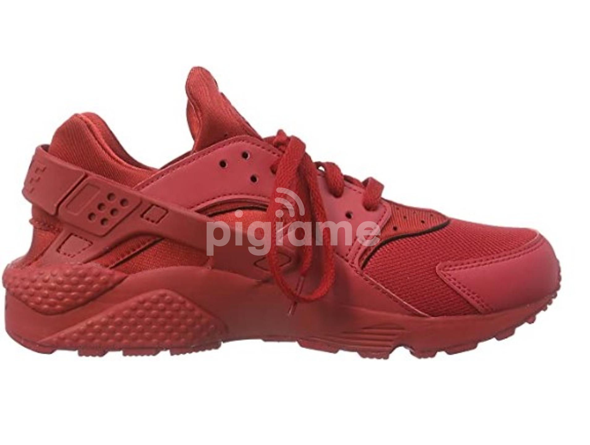 Nike air huarache varsity red top