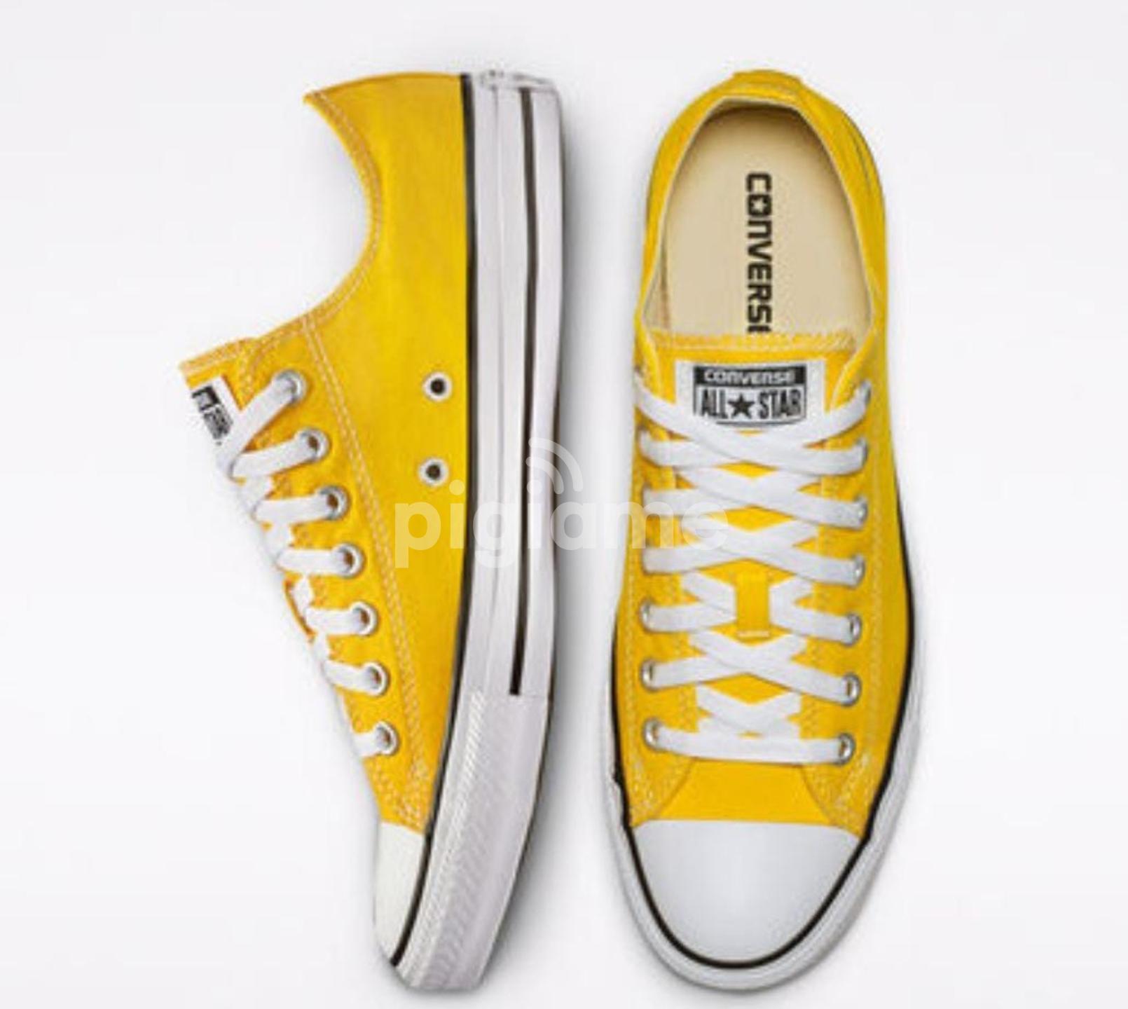 Buy yellow hotsell converse online