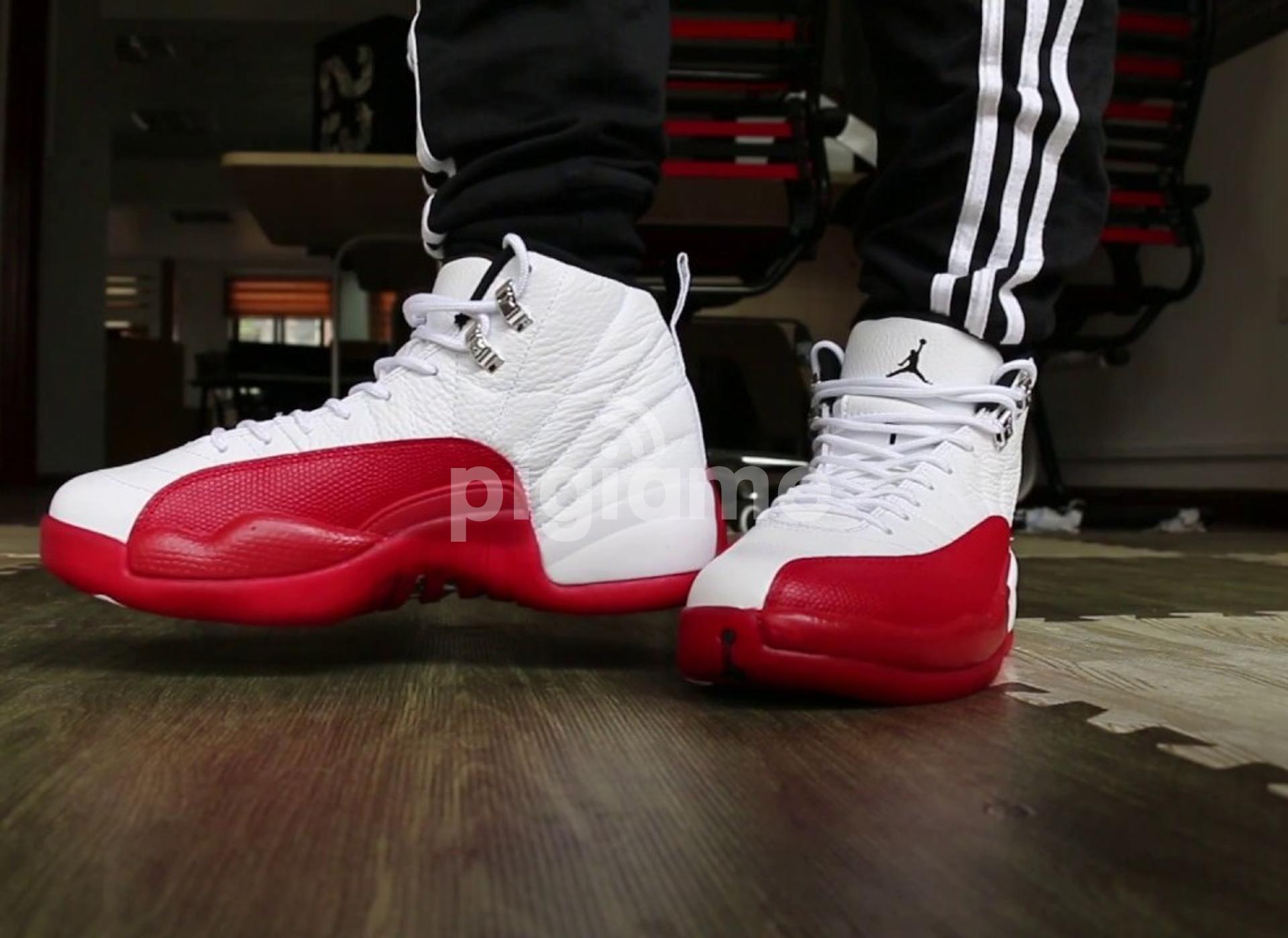 Red jordan 12 on feet store