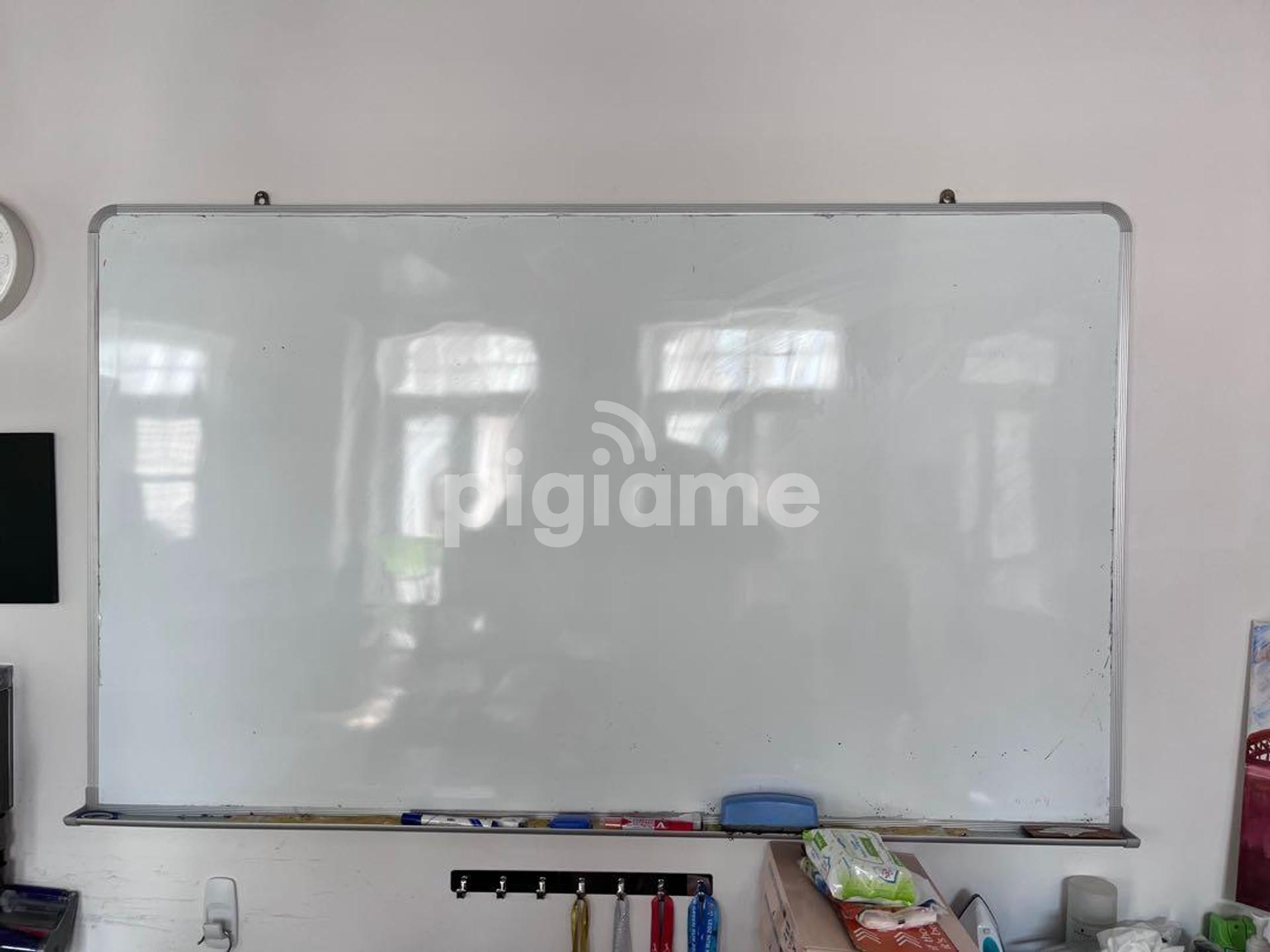 Wall store mounted whiteboard