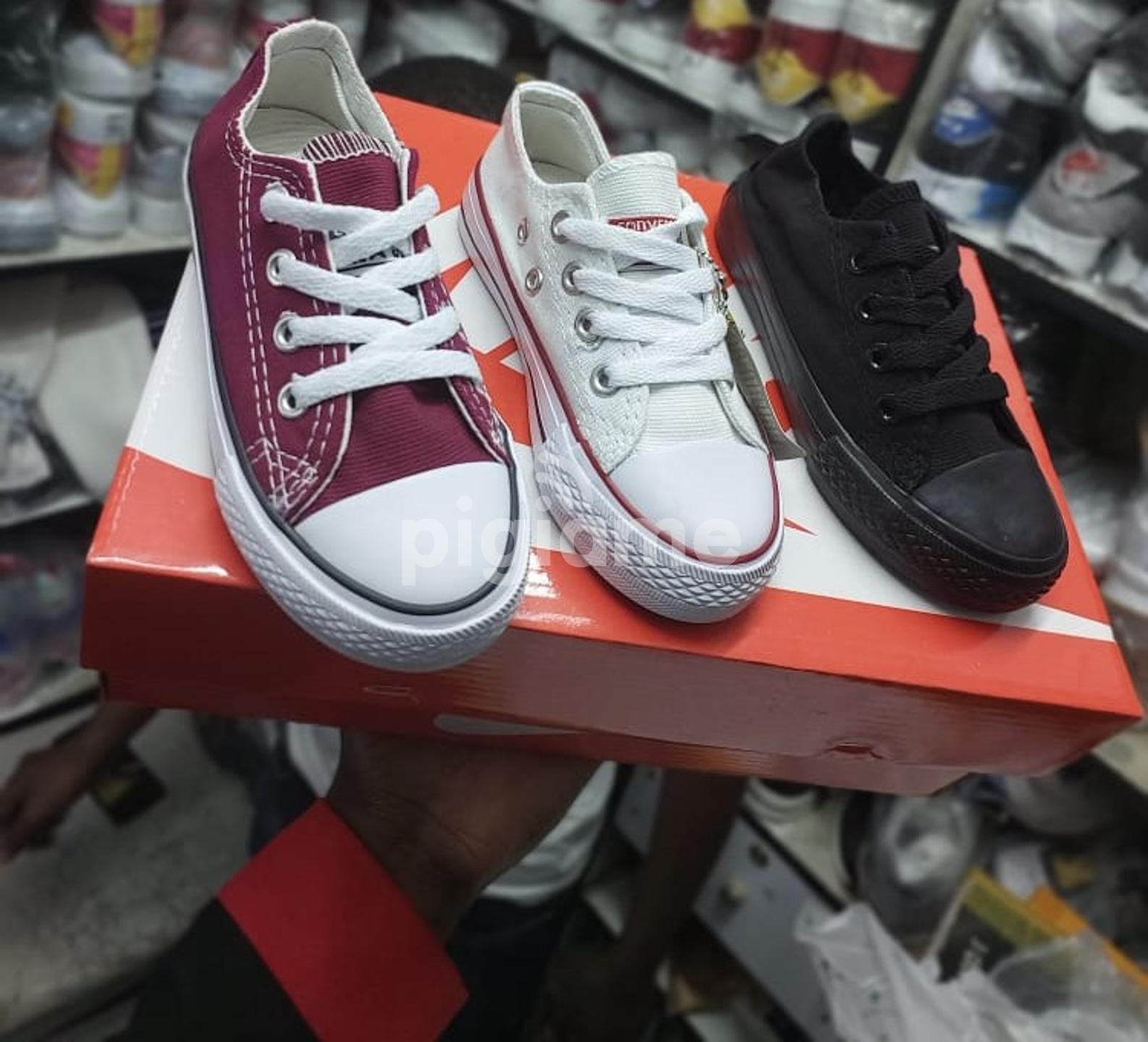 Maroon shop kids converse