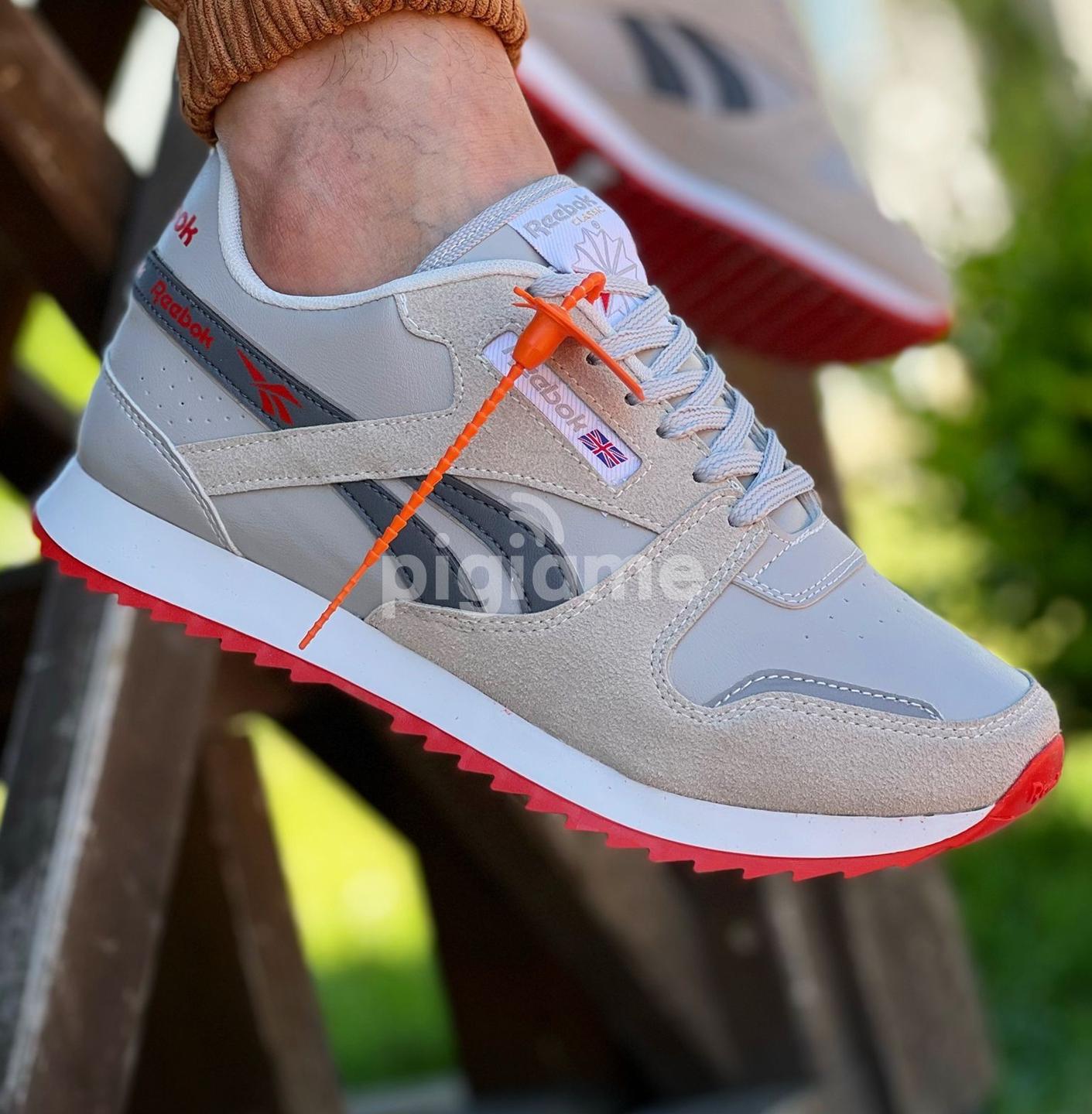 Reebok fashion store brown