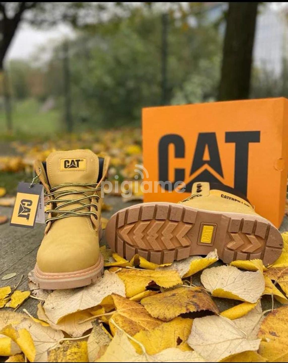 Cat hot sale yellow boots