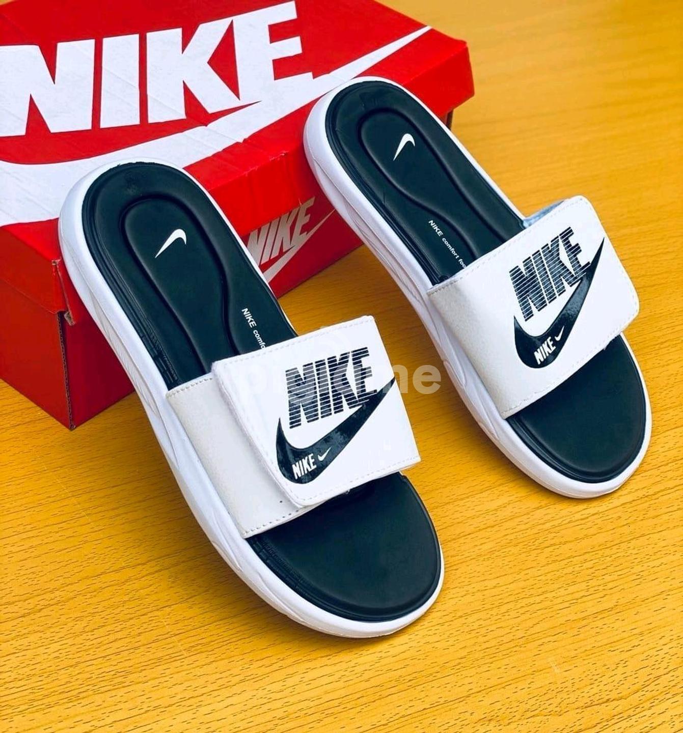 Nike slides size top